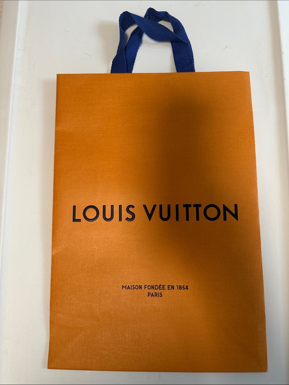 Louis Vuitton Orange Paper Tote with Blue Ribbon Handles